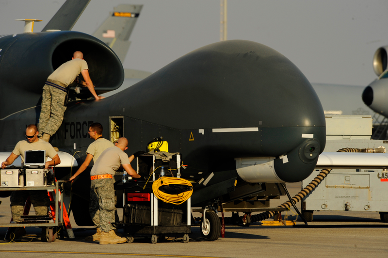 U.S. Air Force maintainers from the 308th Expeditionary Aircraft Maintenance Squadron prepare an RQ-4A Global Hawk for takeoff at an undisclosed location in Southwest Asia, Dec. 2, 2010.